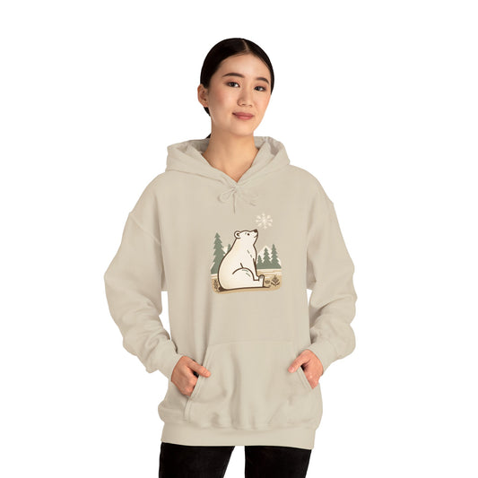 Person wearing a beige hoodie with a polar bear graphic on a white background
