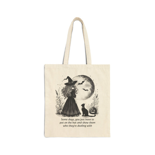 Tote bag with Halloween-themed design featuring a witch and text on a white background