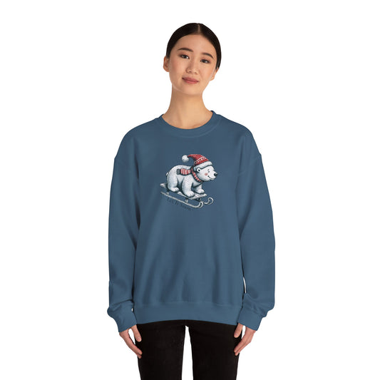 Person wearing a blue sweatshirt with a Christmas polar bear design on a white background
