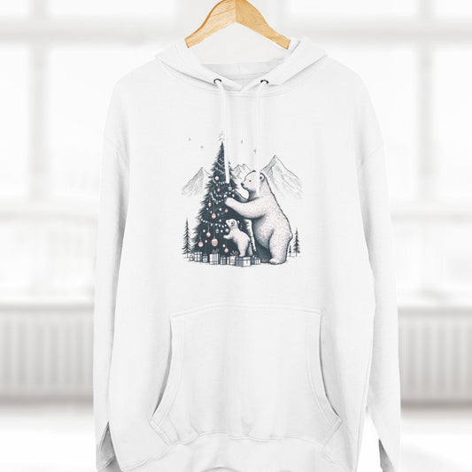 White hoodie with a graphic design of a bear and trees on a hanger against a white background