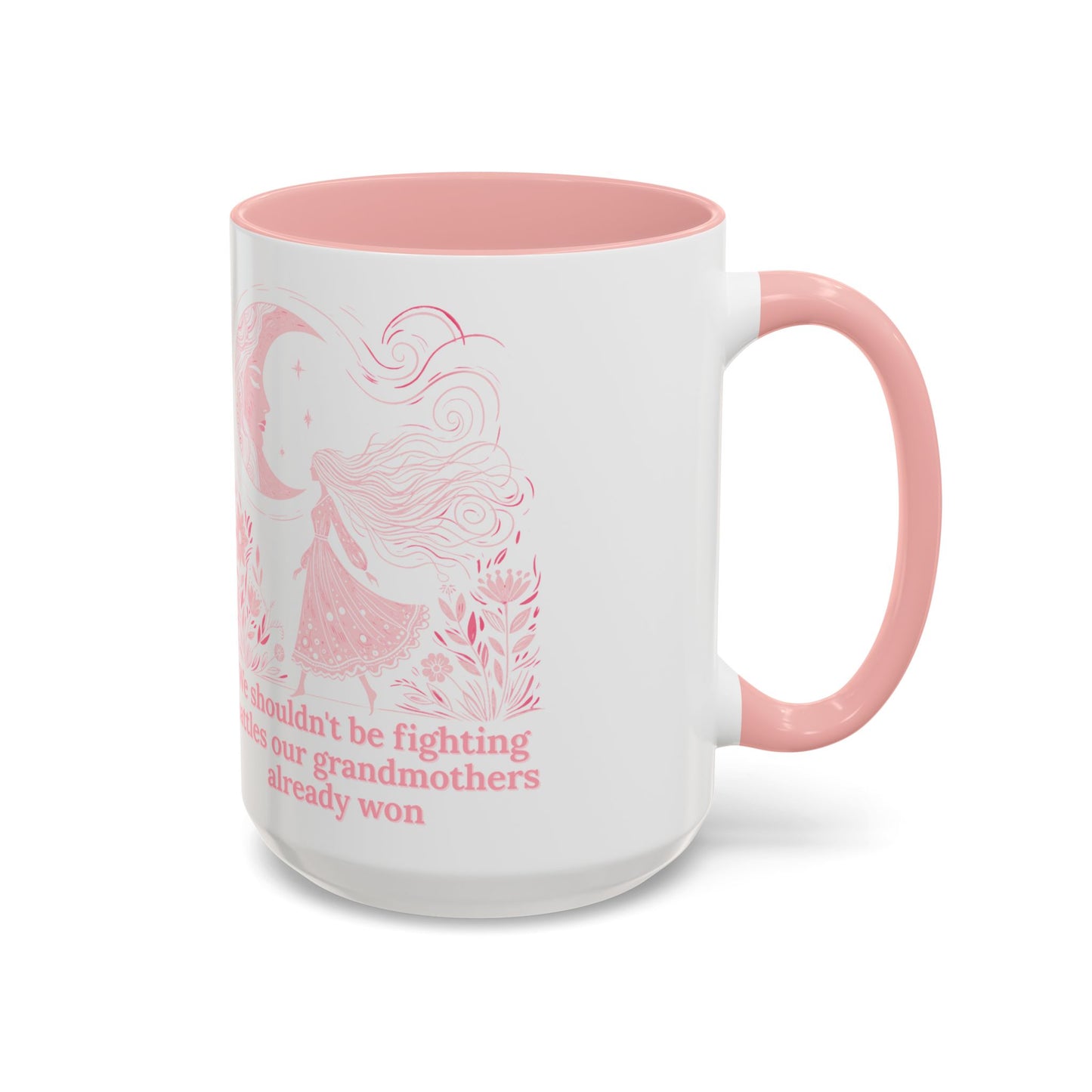 White mug with pink interior and handle, featuring a design and text on a white background