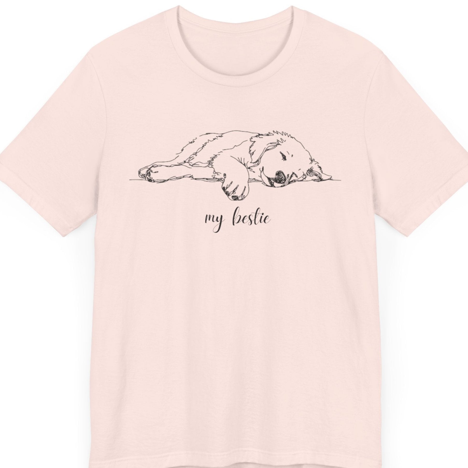 Pink t-shirt with a dog graphic and 'my bestie' text on a white background