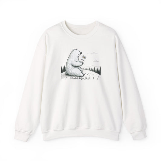 White sweatshirt with a bear graphic and 'wild & gentle' text on a white background