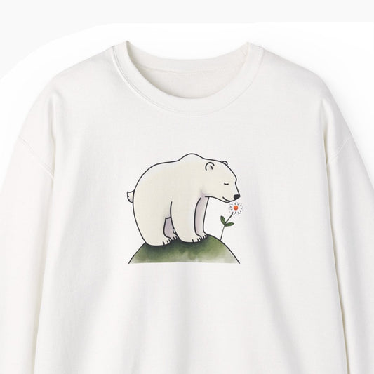 White sweatshirt with a polar bear graphic on a white background