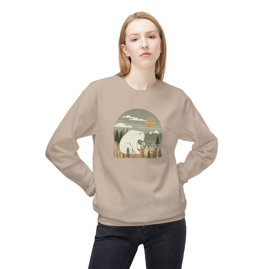 Person wearing a beige sweatshirt with a graphic design of a bear and trees.