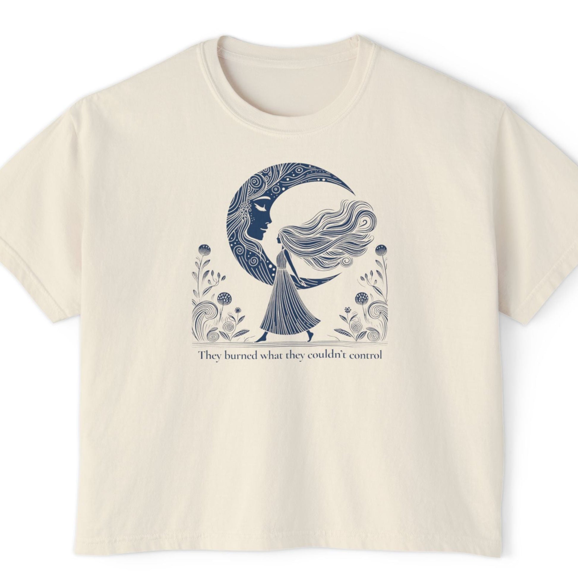 Beige t-shirt with a blue graphic design on a white background