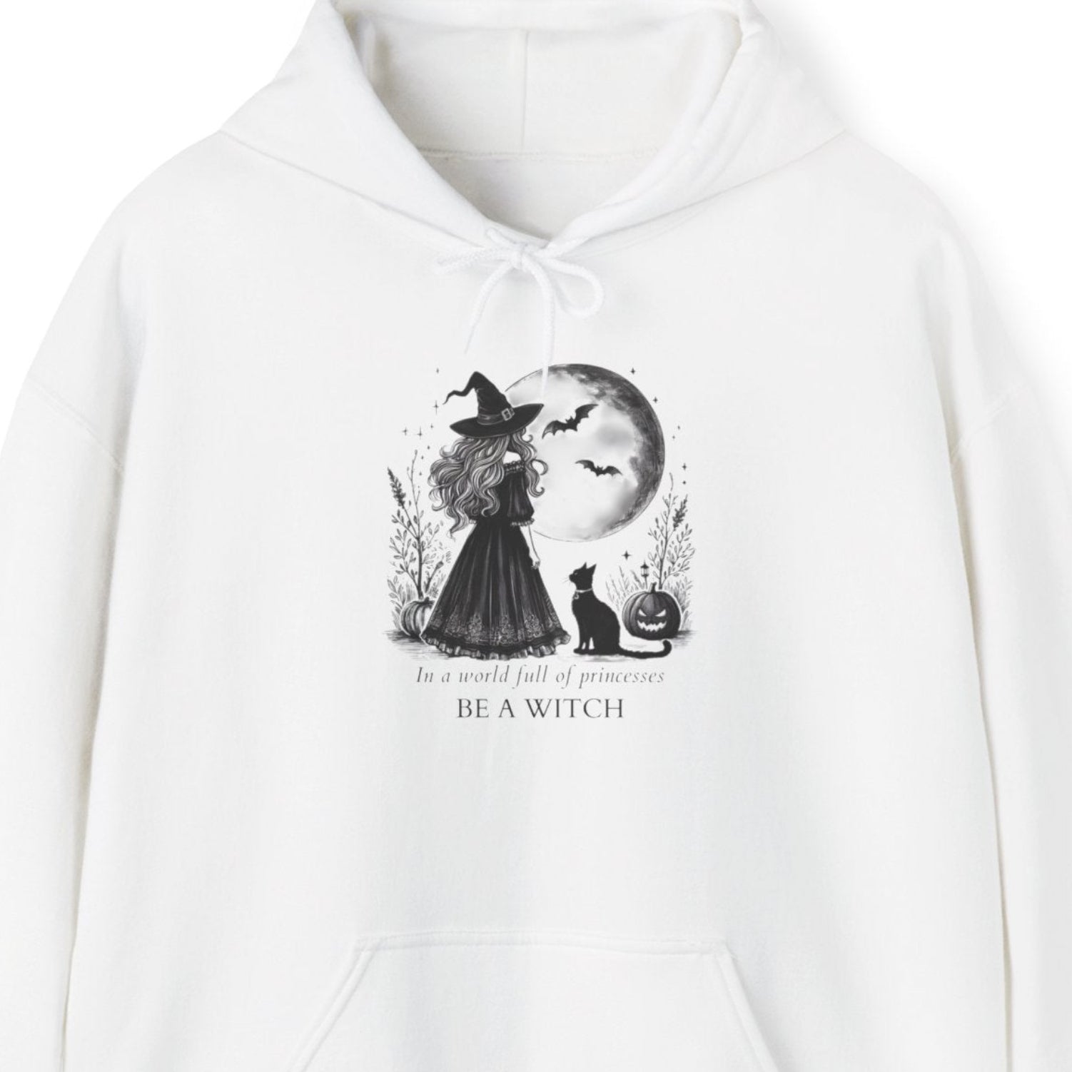 White hoodie with a witch graphic design and text on a white background