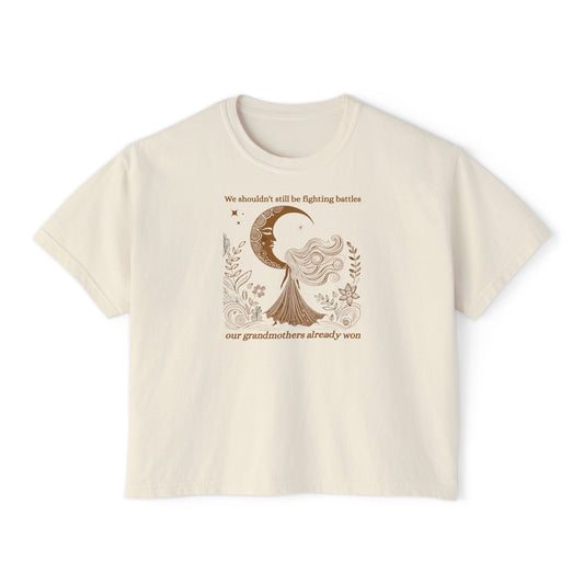 Beige feminist t-shirt with a graphic moon design and text on a white background