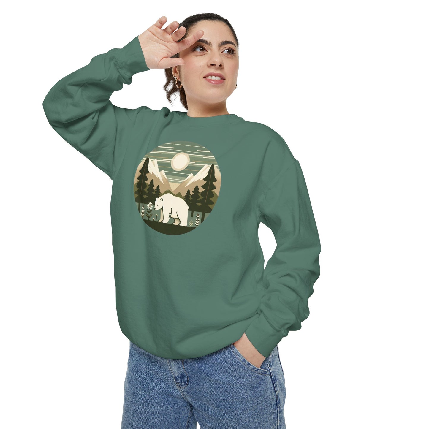 Person wearing a green sweatshirt with a bear graphic on a white background