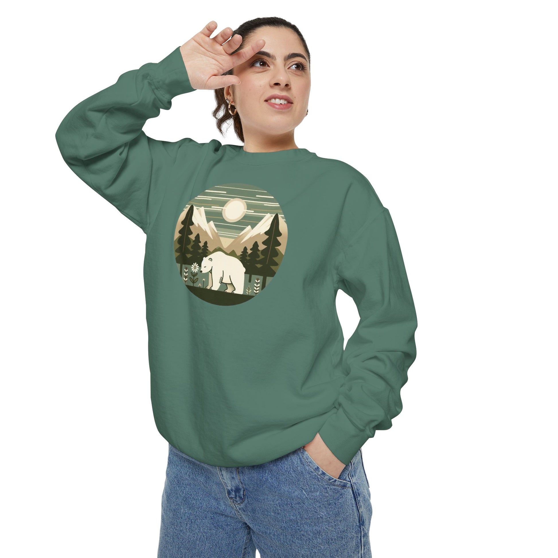 Person wearing a green sweatshirt with a bear graphic on a white background