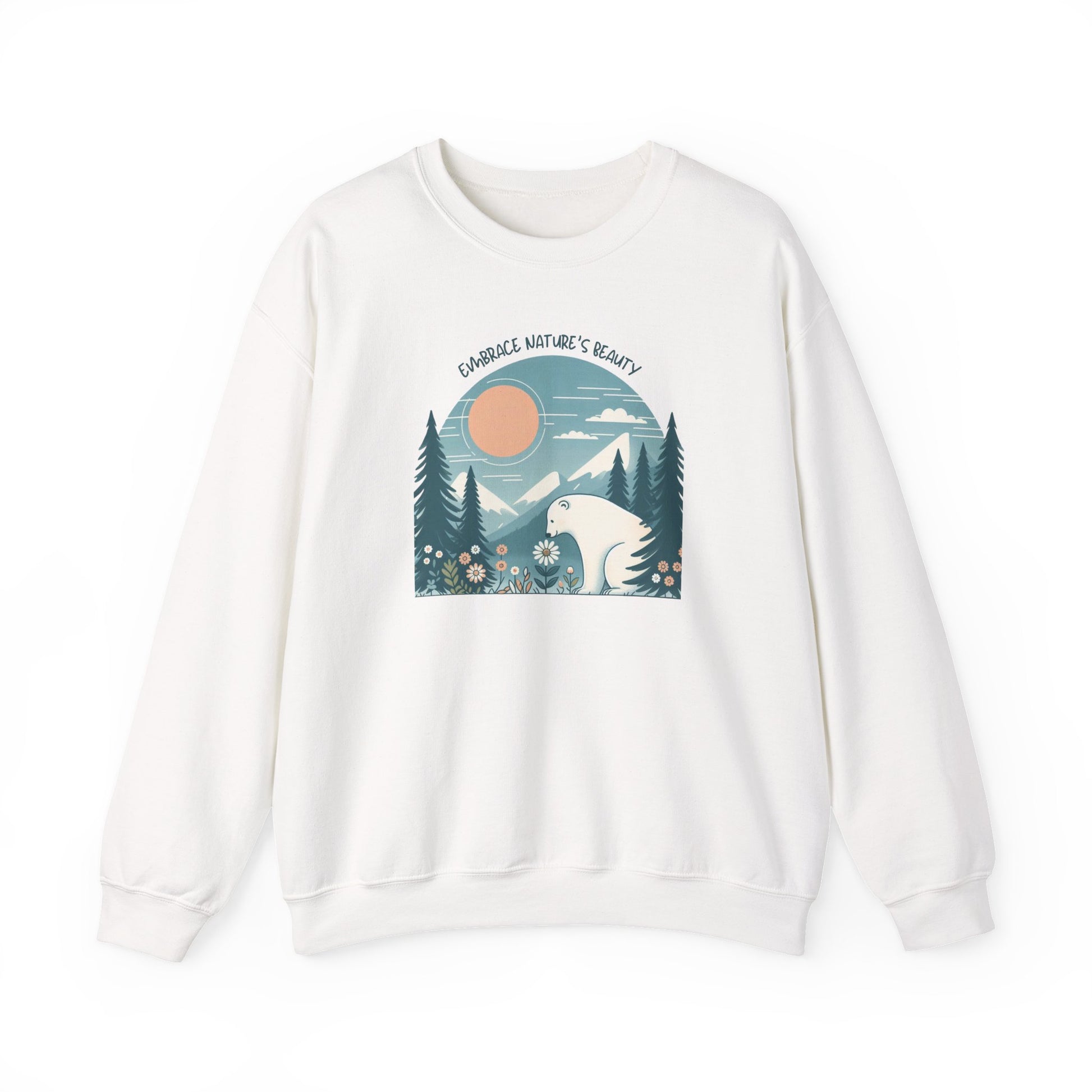 White sweatshirt with polar bear graphic, mountains and sunrise, text reading “Embrace Nature’s Beauty.”