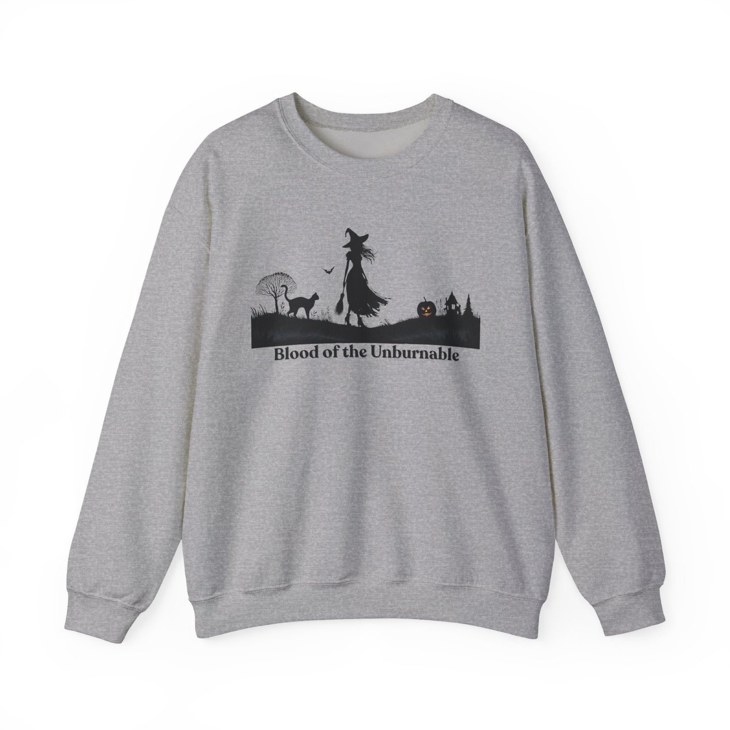 Witch and cat Halloween sweatshirt with pumpkin and spooky house, “Blood of the Unburnable” graphic.