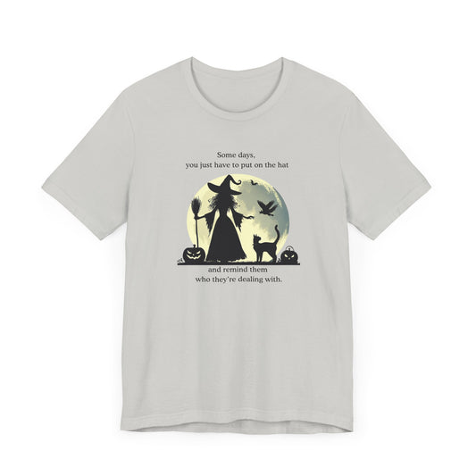 Put On the Hat Tee – Sassy Halloween Witch Graphic Shirt