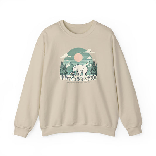 Beige sweatshirt with a graphic of a bear and nature elements on a white background