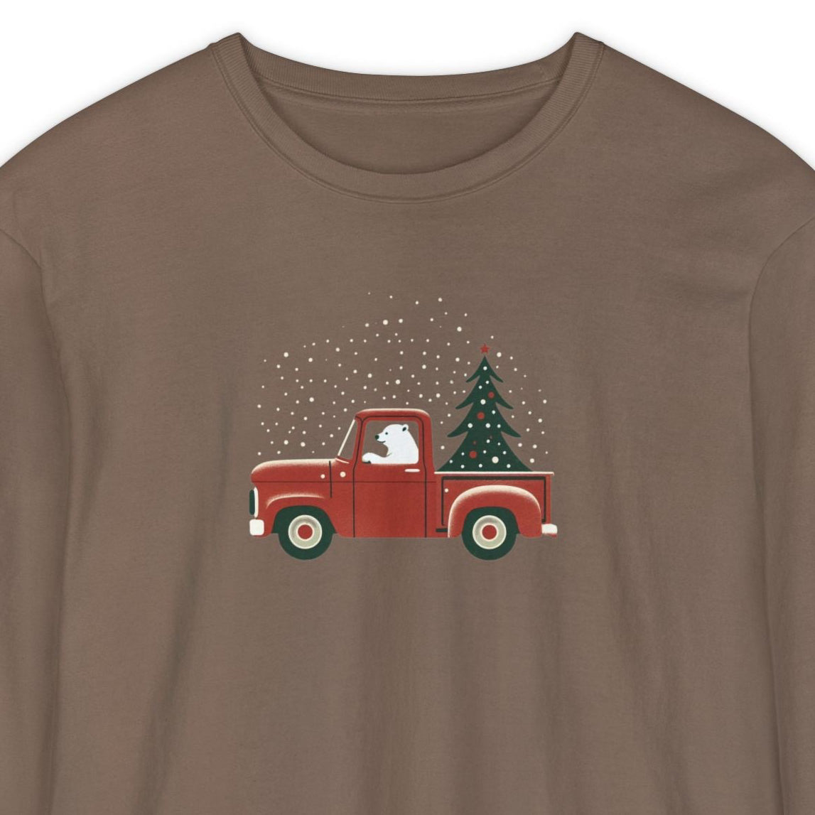 Brown long-sleeve shirt with a red truck and Christmas tree design on a white background