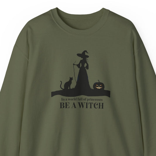 Green sweatshirt with a witch graphic and text on a white background