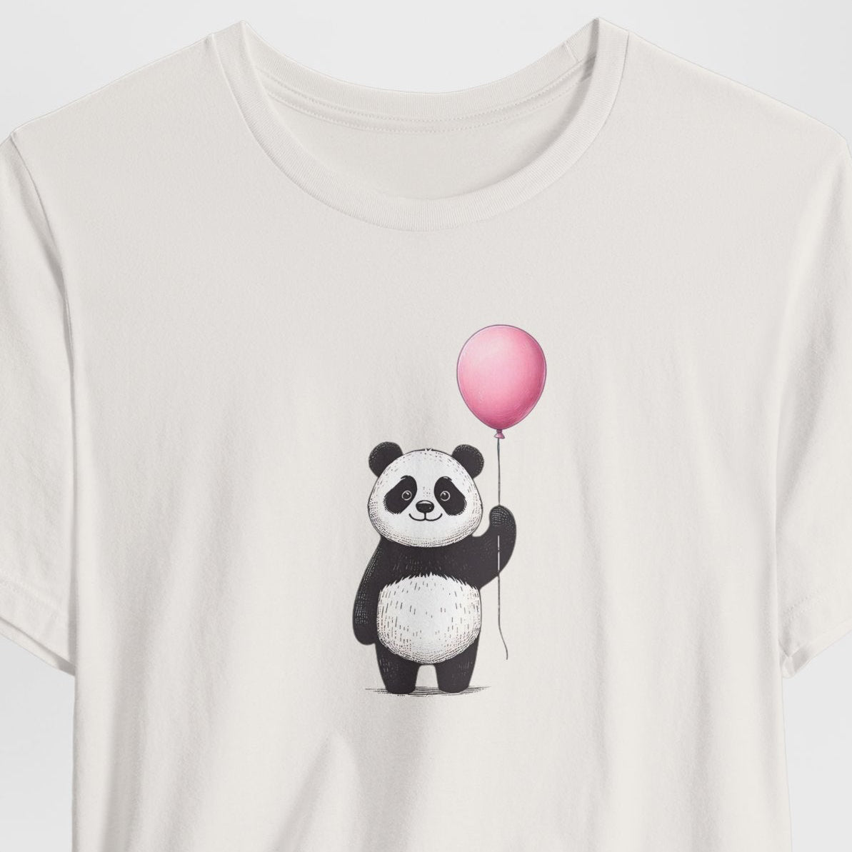 White t-shirt with a panda holding a pink balloon graphic on a white background