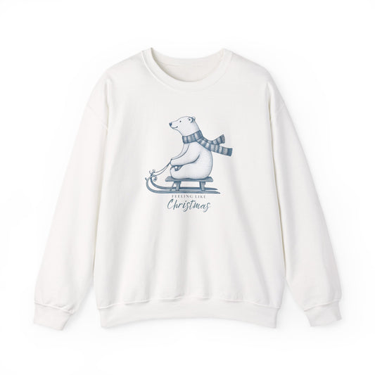 White sweatshirt with a Christmas polar bear graphic and text on a white background