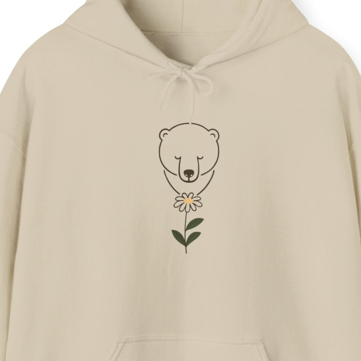 Beige hoodie with a polar bear on the chest against a white background