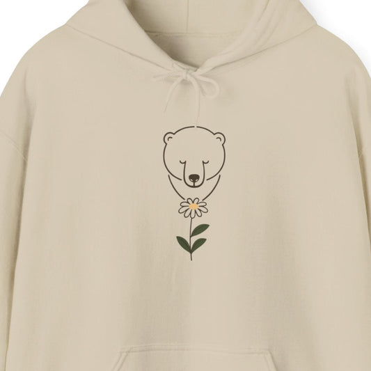Beige hoodie with a polar bear on the chest against a white background
