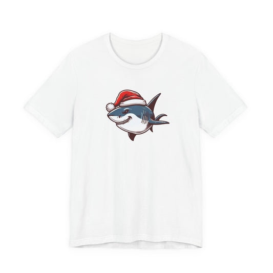 White t-shirt with a shark wearing a Santa hat graphic on a white background