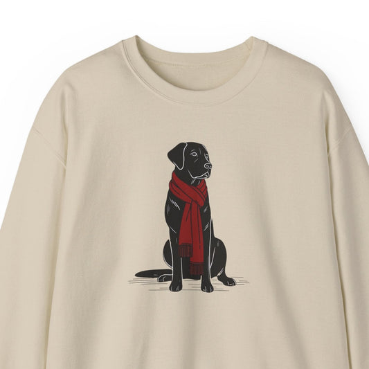 Beige sweatshirt with a black dog wearing a red scarf on a white background
