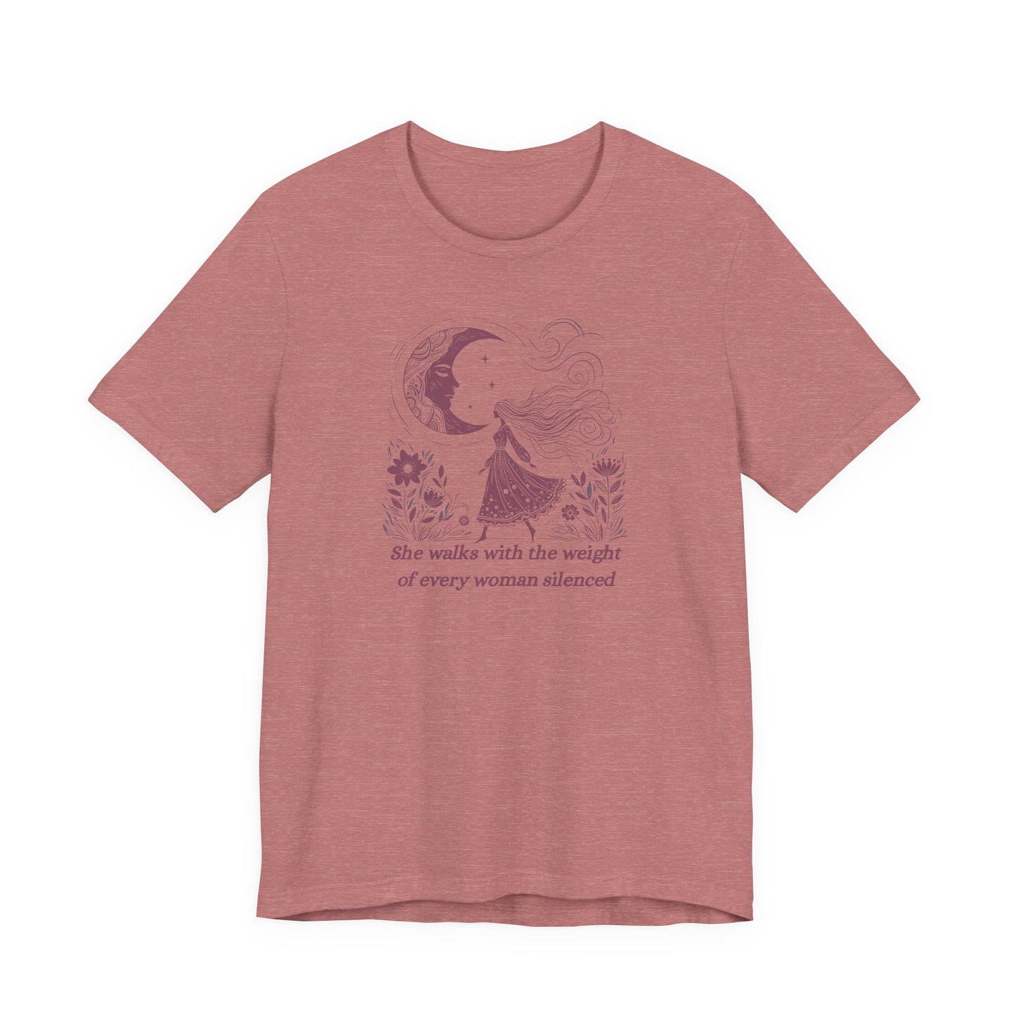 Empowering feminist t-shirt with illustrated woman walking under the moon, floral design, and the quote "She walks with the weight of every woman silenced.