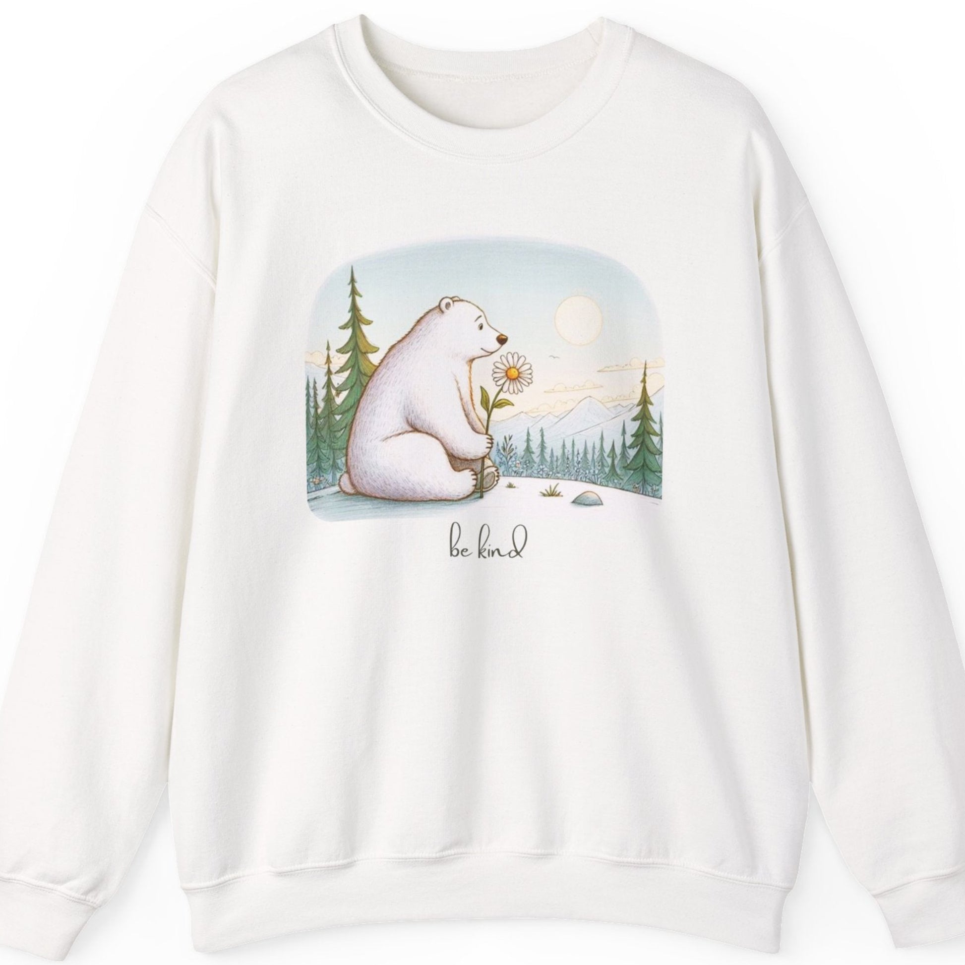 White sweatshirt with a bear holding a flower graphic and 'be kind' text on a white background