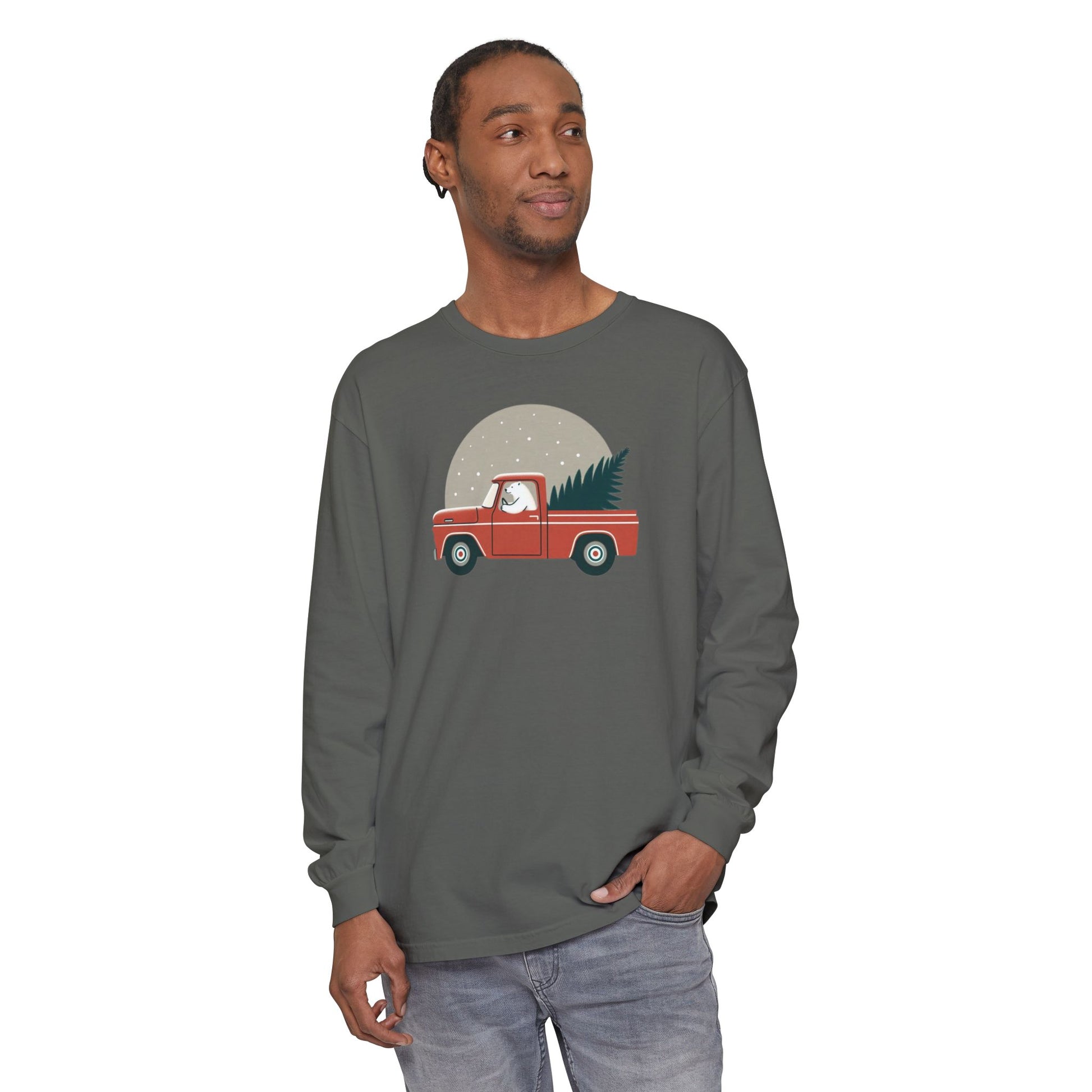Man wearing a gray long-sleeve shirt with a graphic of a red truck carrying a Christmas tree.