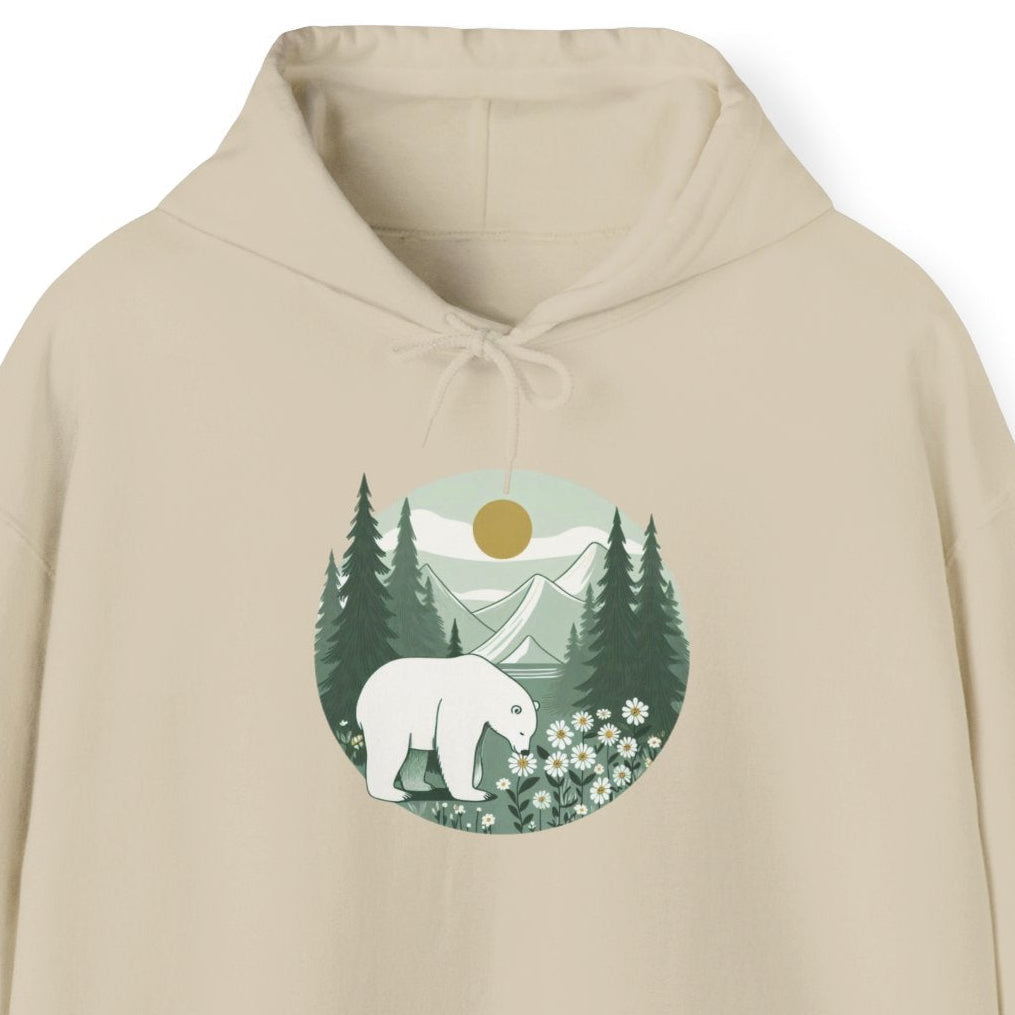 Beige hoodie with a graphic of a bear and trees on a white background