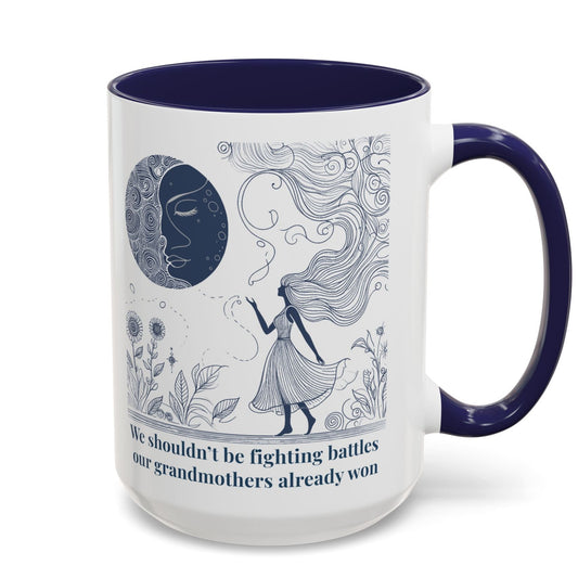 Mug with blue interior and handle, featuring a design and text on a white background