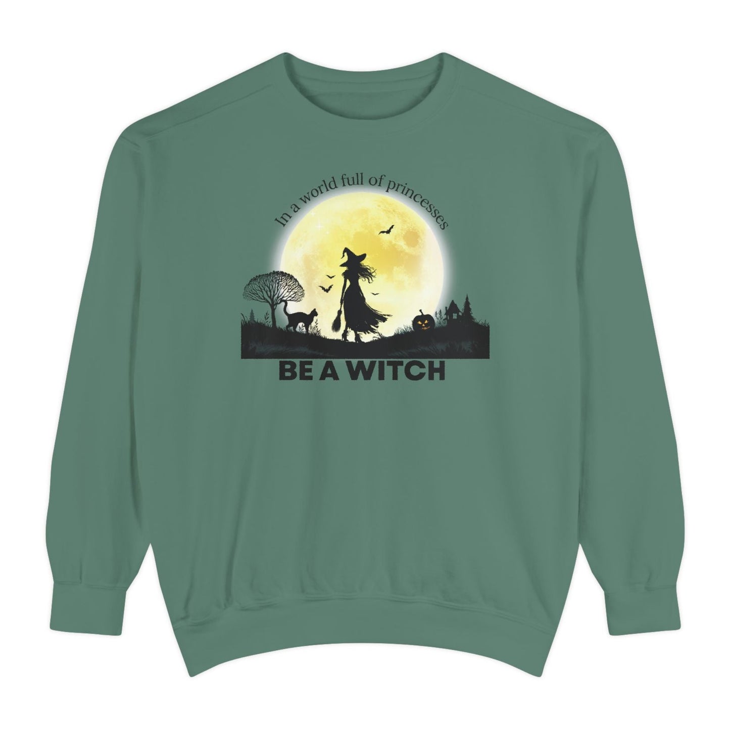 Green sweatshirt with witch graphic and text on a white background