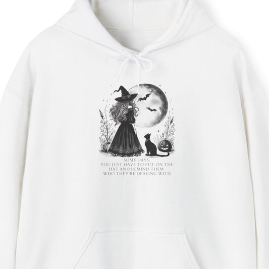White hoodie with a graphic design and text on a white background