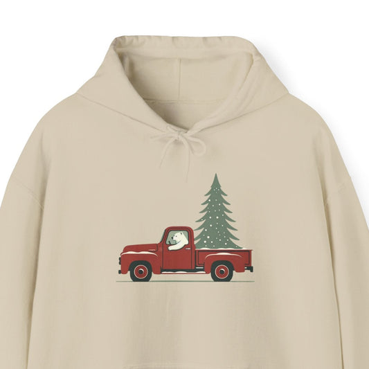 Beige hoodie with a red truck and Christmas tree design on a white background