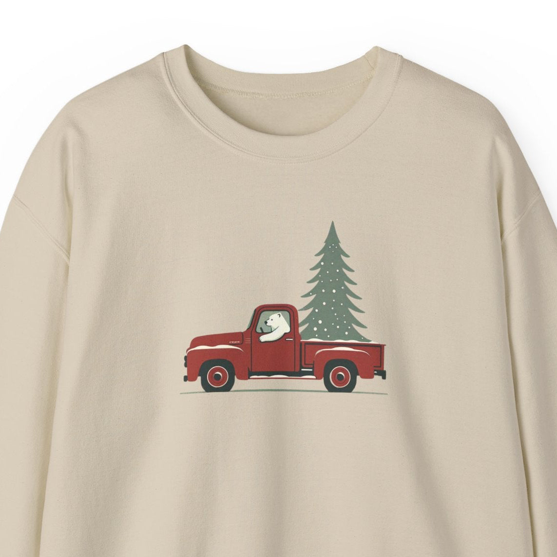 Beige sweatshirt with a red truck and Christmas tree design on a white background
