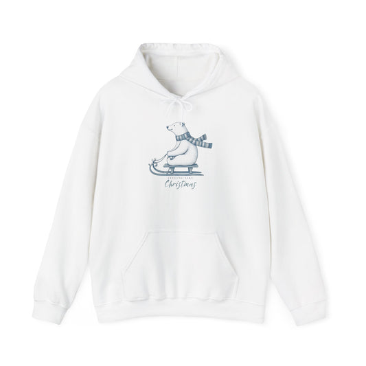 White hoodie with a Christmas polar bear design on a white background