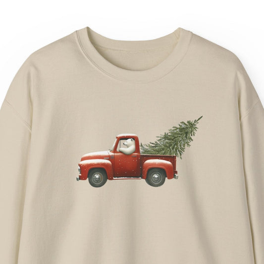 Beige sweatshirt with a red truck and Christmas tree design on a white background