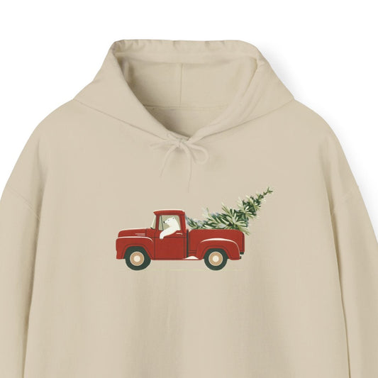 Beige hoodie with a red truck and Christmas tree design on a white background