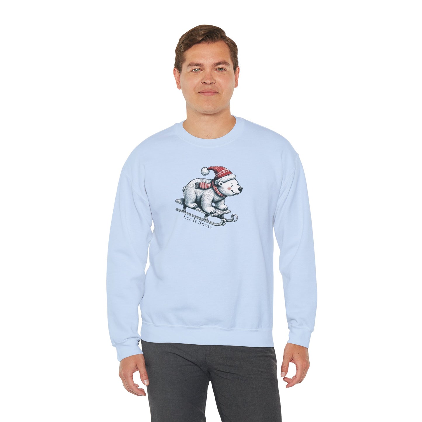 Man wearing a light blue sweatshirt with a Christmas polar bear graphic on a white background