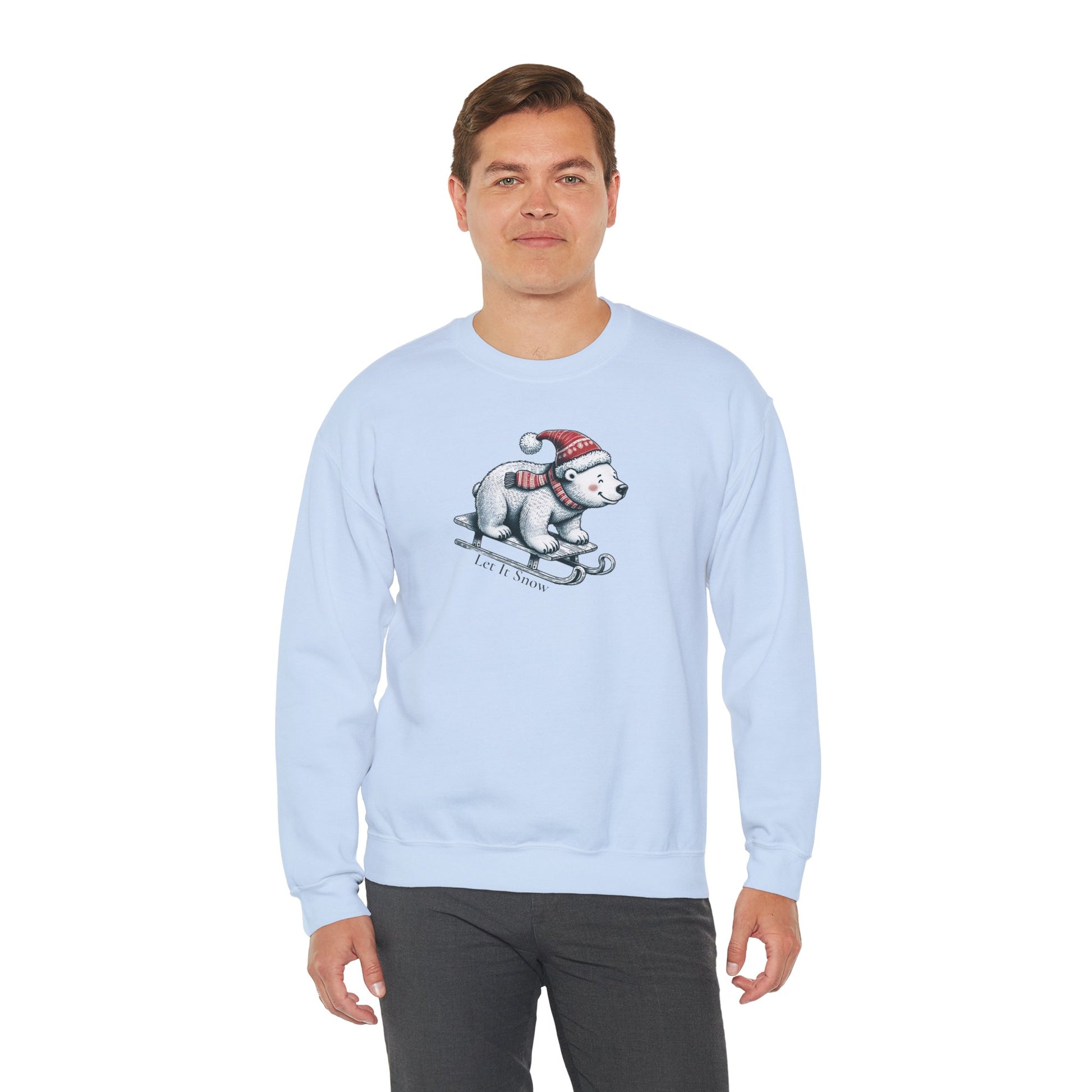 Man wearing a light blue sweatshirt with a Christmas polar bear graphic on a white background
