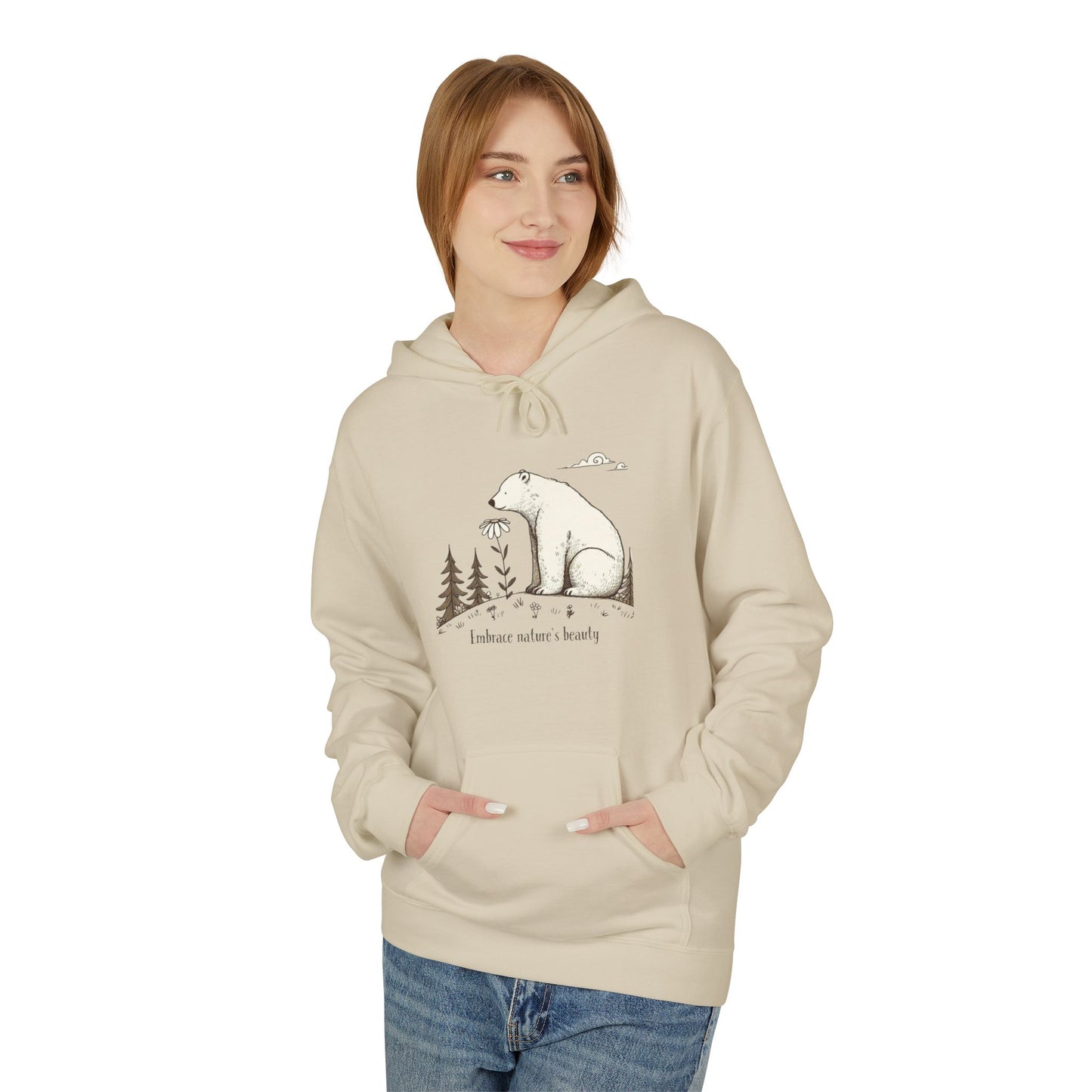Person wearing a beige hoodie with a bear graphic and text on a white background