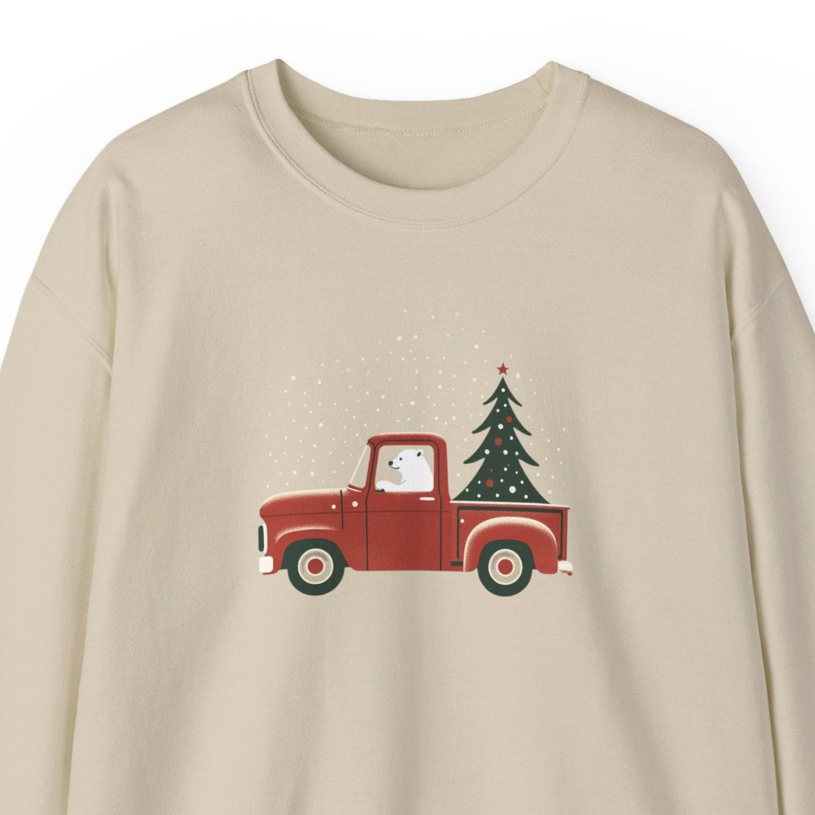 Beige sweatshirt with a red truck and Christmas tree design on a white background